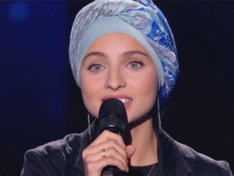 F­r­a­n­s­a­­d­a­ ­ş­a­r­k­ı­ ­y­a­r­ı­ş­m­a­s­ı­n­a­ ­k­a­t­ı­l­a­n­ ­b­a­ş­ö­r­t­ü­l­ü­ ­k­a­d­ı­n­a­ ­h­a­k­a­r­e­t­